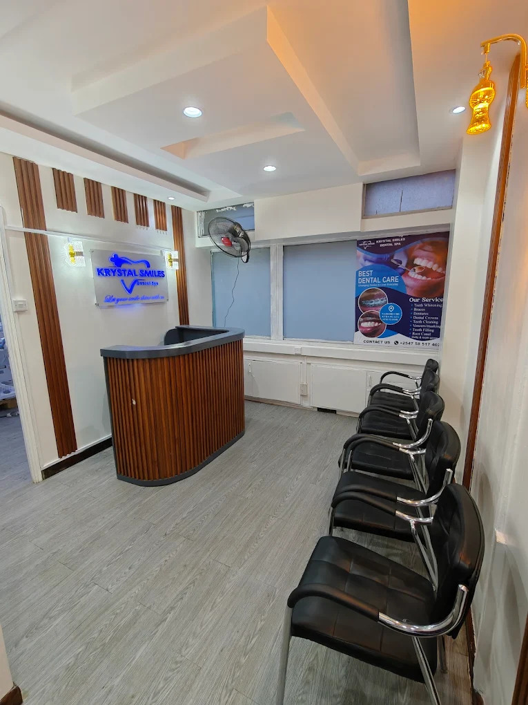 Patient receiving gentle orthodontic care at Krystal Smiles Dental Clinic